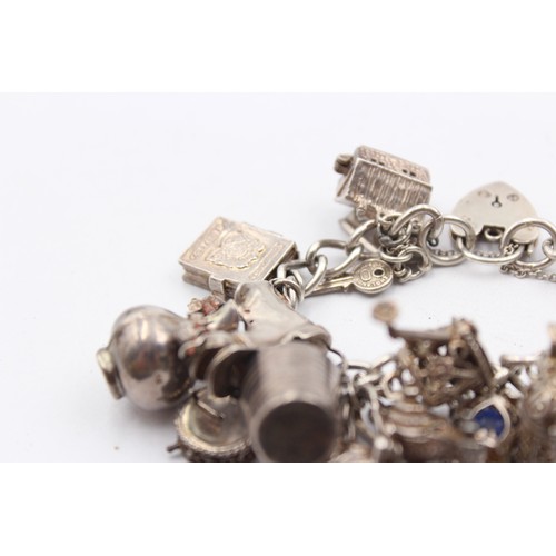 410 - .925 Charm Bracelet With Assorted Charms (93g)