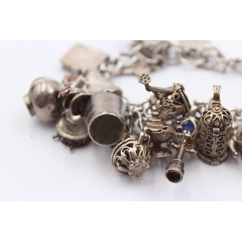 410 - .925 Charm Bracelet With Assorted Charms (93g)