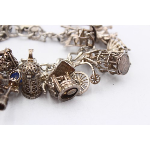 410 - .925 Charm Bracelet With Assorted Charms (93g)