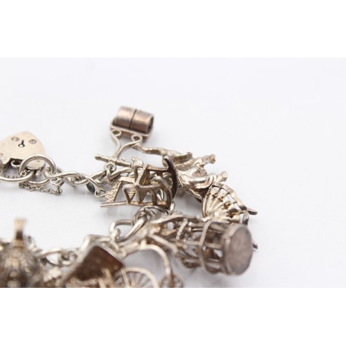 410 - .925 Charm Bracelet With Assorted Charms (93g)