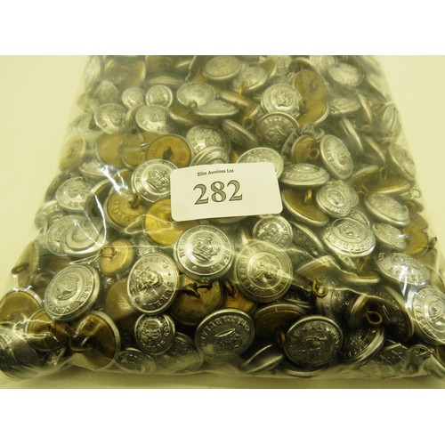 282 - APPROXIMATELY 2KG OF UNIFORM BUTTONS AND COLLARS