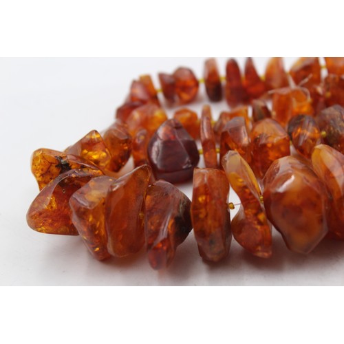 430 - A Large Amber Nugget Necklace (197g)