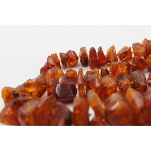 430 - A Large Amber Nugget Necklace (197g)