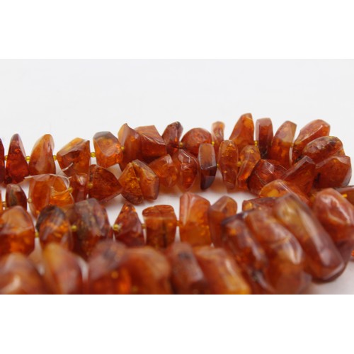 430 - A Large Amber Nugget Necklace (197g)