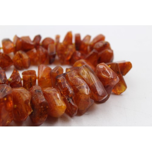 430 - A Large Amber Nugget Necklace (197g)