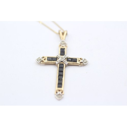 462 - 9ct yellow and white gold sapphire and diamond paved cross pendant necklace (1.8g)