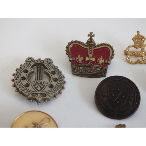 239 - 9 OLD BADGES INCLUDES MILITARY FOR HOME & COUNTRY, ROYAL CROWN, ART DECO ENAMEL SKIER etc