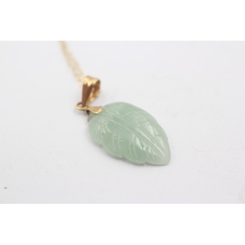 488 - 9ct gold chain and bail on jade leaf carved pendant necklace (1.8g)