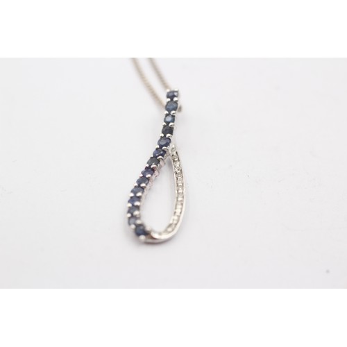 492 - 9ct white gold diamond and sapphire peaved loop pendant necklace (2.3g)