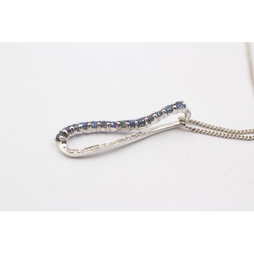 492 - 9ct white gold diamond and sapphire peaved loop pendant necklace (2.3g)