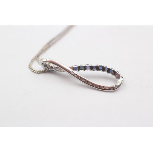 492 - 9ct white gold diamond and sapphire peaved loop pendant necklace (2.3g)