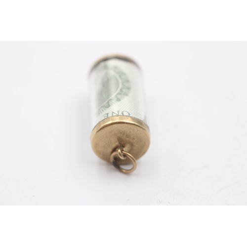 496 - 9ct gold one pound cylinder case charm pendant (3.3g)