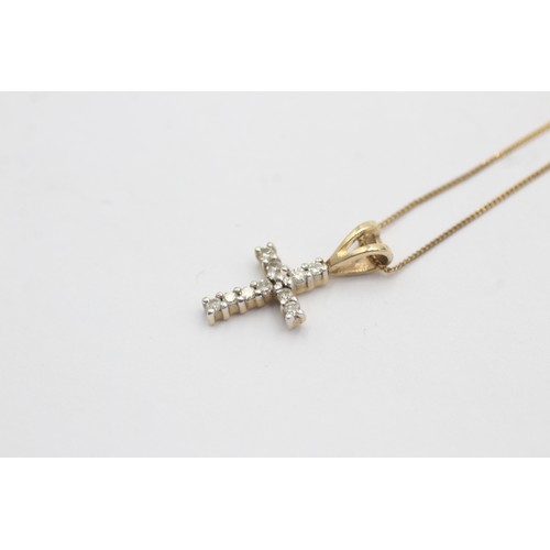 504 - 9ct yellow and white gold diamond paved cross pendant necklace (1g)