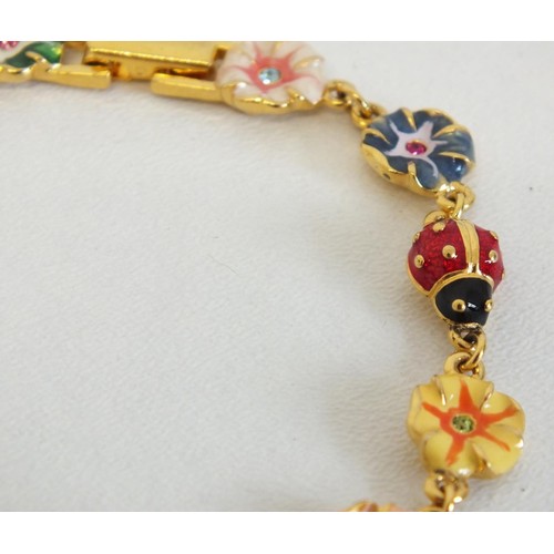 248 - SIGNED JOAN RIVERS GOLDTONE ENAMEL & CRYSTAL LADYBUG & FLOWERS BRACELET 7.5