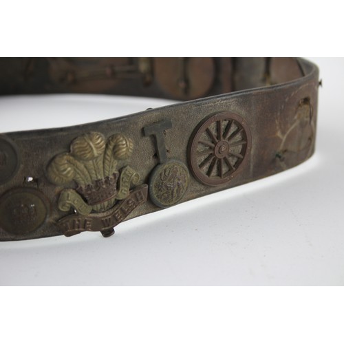 519 - Old Leather Belt w/ Military Badges & Buttons Inc Irish, Canadian, Etc