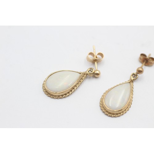 544 - 9ct gold opal teardrop drop stud earrings (2.3g)