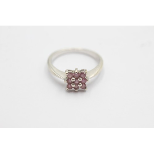 580 - 9ct white gold pink sapphire cluster ring (3g) SIZE- N