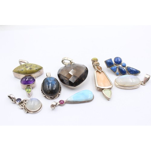 602 - 8 X .925 Gemstone Set Pendants (102g)