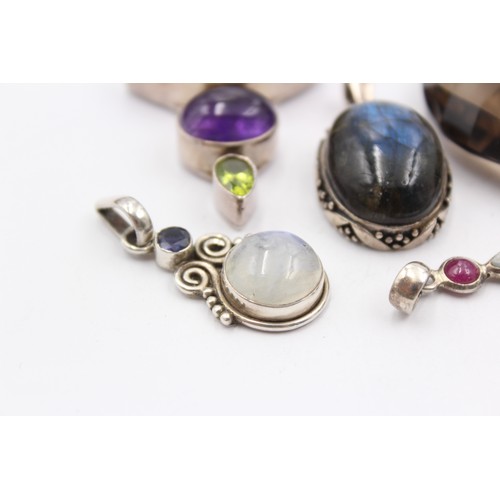 602 - 8 X .925 Gemstone Set Pendants (102g)