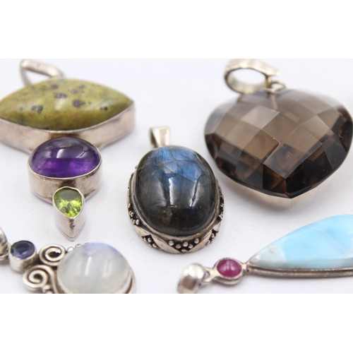 602 - 8 X .925 Gemstone Set Pendants (102g)