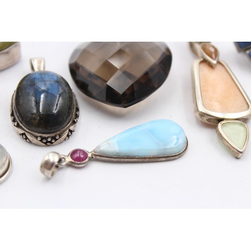 602 - 8 X .925 Gemstone Set Pendants (102g)