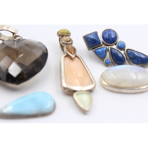 602 - 8 X .925 Gemstone Set Pendants (102g)