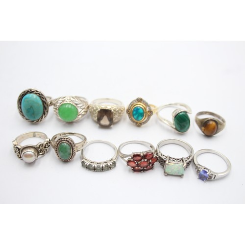 610 - 12 X .925 Gemstone Set Rings (57g)