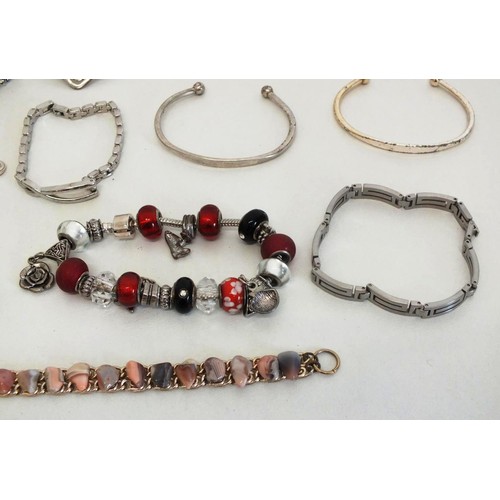 283 - 12x ASSORTED FASHION BRACELETS & BANGLES