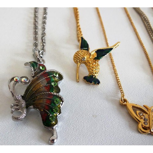 287 - 5 GOLDTONE AND SILVERTONE NECKLACES, BUTTERFLIES AND HUMMING BIRD