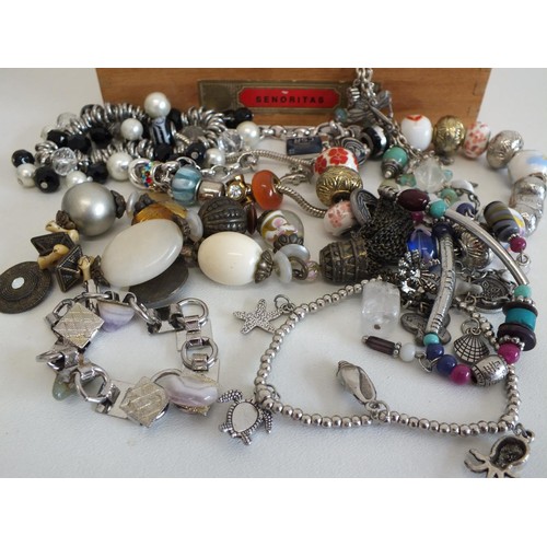 46 - BOX OF ASSORTED JEWELLERY & CHARM BRACELETS SOME SILVER