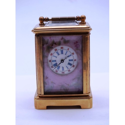 24 - MINIATURE 8 DAY BRASS CARRIAGE CLOCK WITH ENAMEL DECORATION WORKING WITH KEY, APPROX HEIGHT 8cm