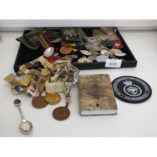 35 - COLLECTION OF MILITARY RELATED ITEMS TO INCLUDE CLOTH PATCHES, MEDALS, BIBLE BOOK, ENAMEL FOB SPOONS... 