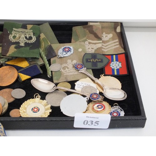 35 - COLLECTION OF MILITARY RELATED ITEMS TO INCLUDE CLOTH PATCHES, MEDALS, BIBLE BOOK, ENAMEL FOB SPOONS... 