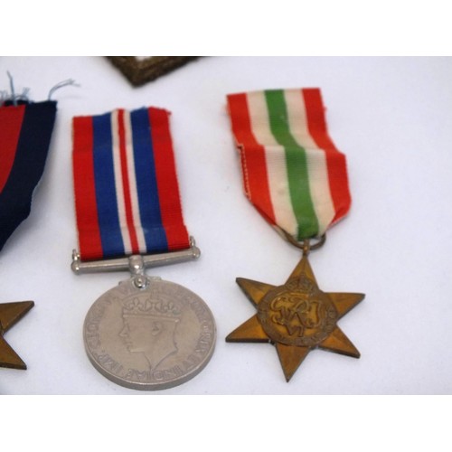 48 - MILITARY MEDALS, BADGES & PATCHES INCLUDES DEFENCE MEDALS, WAR MEDAL, STARS ETC