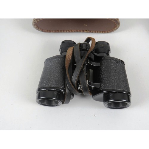 11 - TWO SETS OF BINOCULARS WIRH LEATHER CARRY CASES