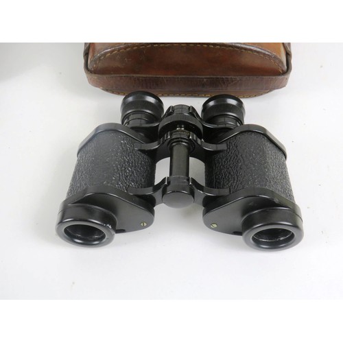 11 - TWO SETS OF BINOCULARS WIRH LEATHER CARRY CASES