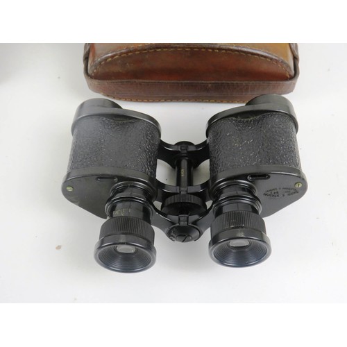 11 - TWO SETS OF BINOCULARS WIRH LEATHER CARRY CASES