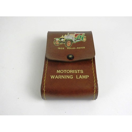 12 - PIFCO MOTORISTS WARNING LAMP IN BROWN LEATHER POUCH