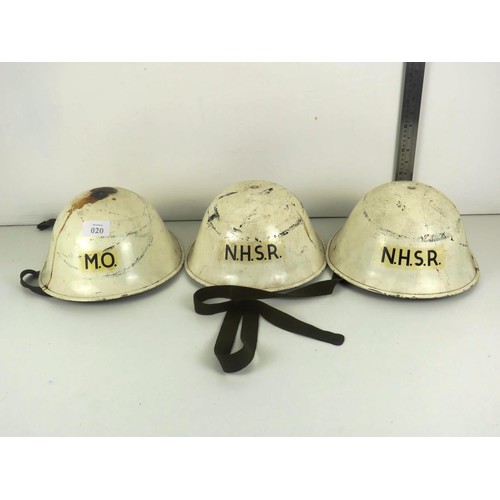 20 - THREE METAL HELMETS, 2 x NATIONAL HOSPITAL SERVICE RESERVES- ONE IMPRESSED MARK INSIDE READS RO&CO S... 