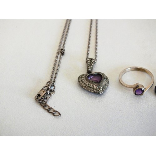 137 - SET OF STERLING SILVER AND AMETHYST JEWELLERY INCLUDING EARRINGS, PENDANT ON CHAIN AND RING