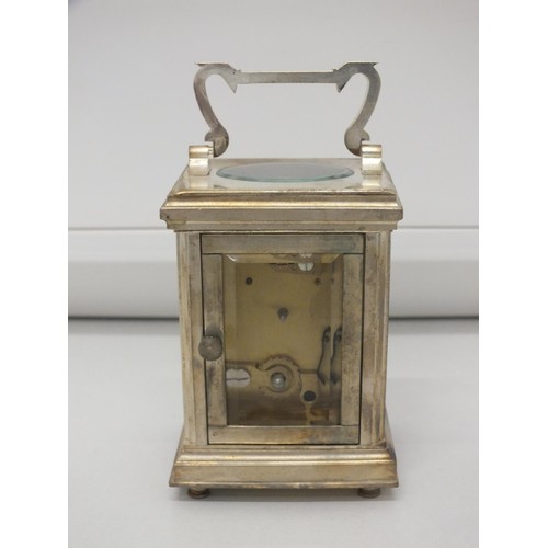 38 - MINIATURE CARRIAGE CLOCK WITH KEY IN WORKING ORDER