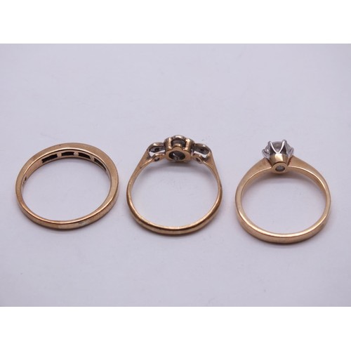 44 - THREE 9CT GOLD RINGS INCLUDES PLATINUM AND GOLD THREE STONE DIAMOND SET RING SIZE N, DIAMOND SOLITAI... 