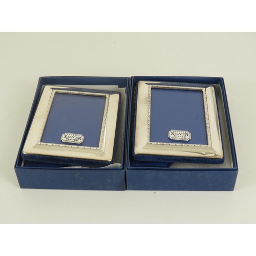 169 - PAIR OF SILVER PLATE PICTURE FRAMES