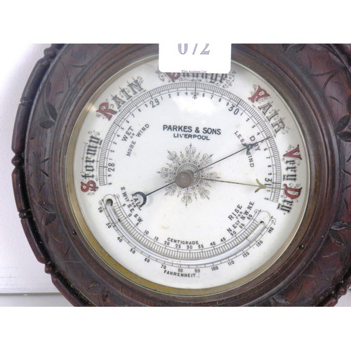 72 - CARVED OAK CASED EDWARDIAN ANEROID BAROMETER - PARKES AND SONS LIVERPOOL