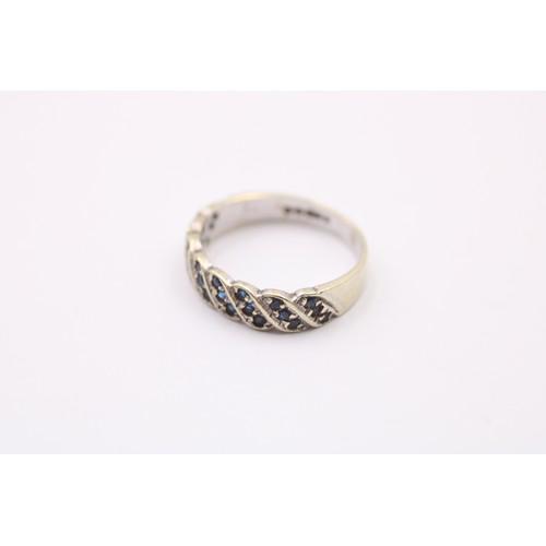 457 - 9ct White Gold Blue Paste Scroll Design Half Eternity Ring (2.1g) SIZE- L