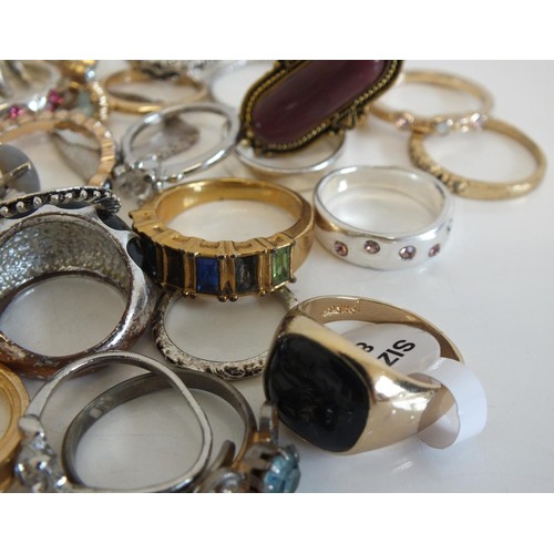 242 - 47 ASSORTED FASHION RINGS