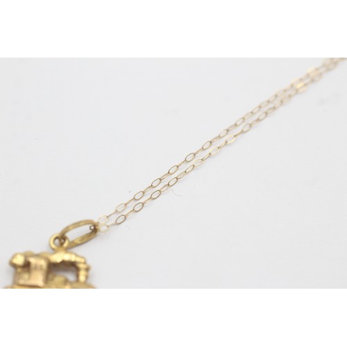 541 - 9ct Gold Train Pendant On Chain (1.4g)