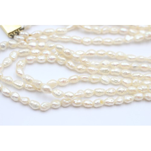 565 - 9ct Gold Cultured Pearl Clasped Necklace (33.1g)