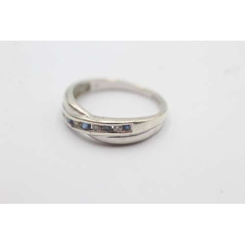 597 - 9ct White Gold Diamond And Sapphire Channel Set Bypass Half Eternity Ring (2.3g) SIZE- N