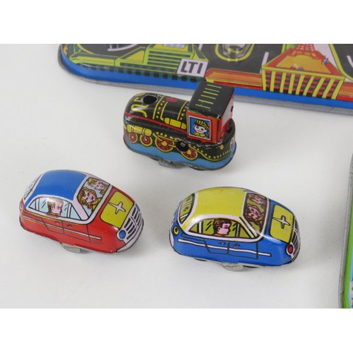 123 - COLELCTION OF TINPLATE TOYS